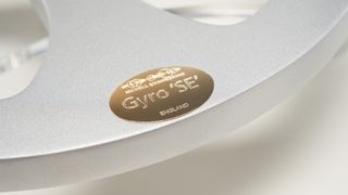 Michell Gyro SE / Cusis S turntable close up on platter and badge