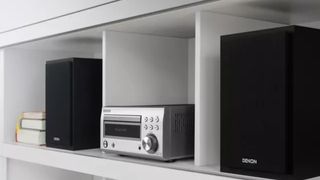 Denon D-M41DAB system placed in a book case